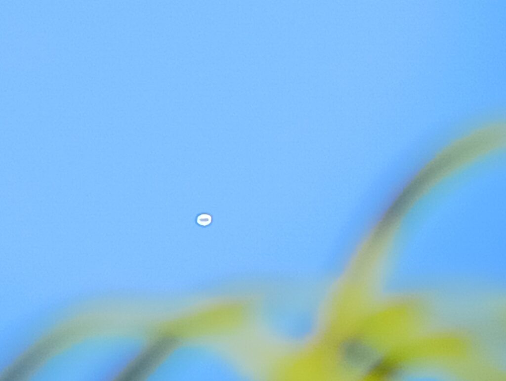 Zoomed image of unidentified object, UAP, UFo, etc. Probably a balloon.