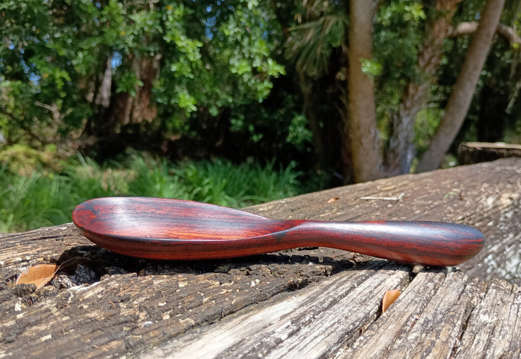 Side view of short, stubby, extra stout cocobolo spoon @ 8.25 inches. Hand made 04-19-2025, Sarasota, FL