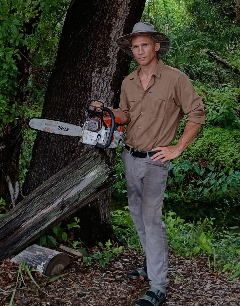 Theo holding Stihl ms261 chainsaw. My favorite all purpose saw.