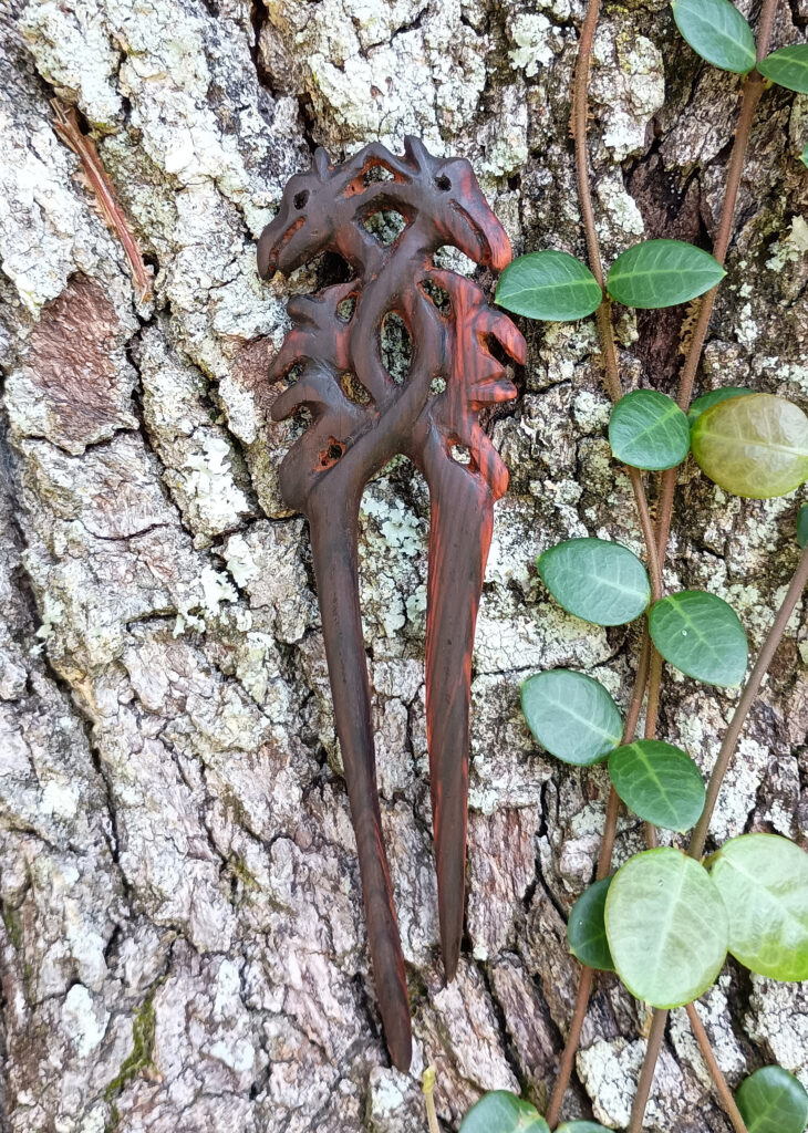 Dragon themed hairpin made of cocobolo wood. 08-08-2025 Sarasota